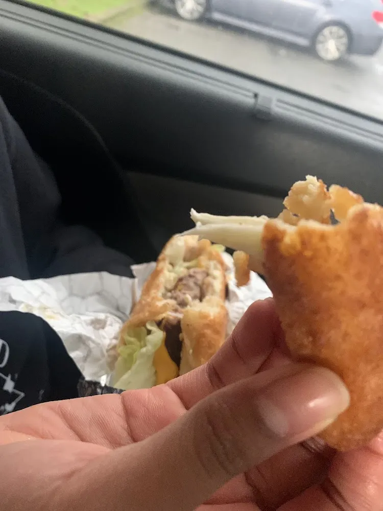 Mozzarella Sticks with Deluxe Burger in the Back